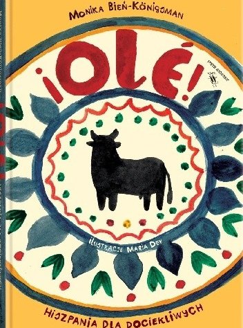 Namalowany czarny byk w kole wśród kwiatów